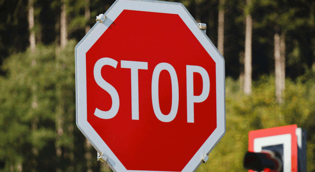 Red stop sign in a natural setting